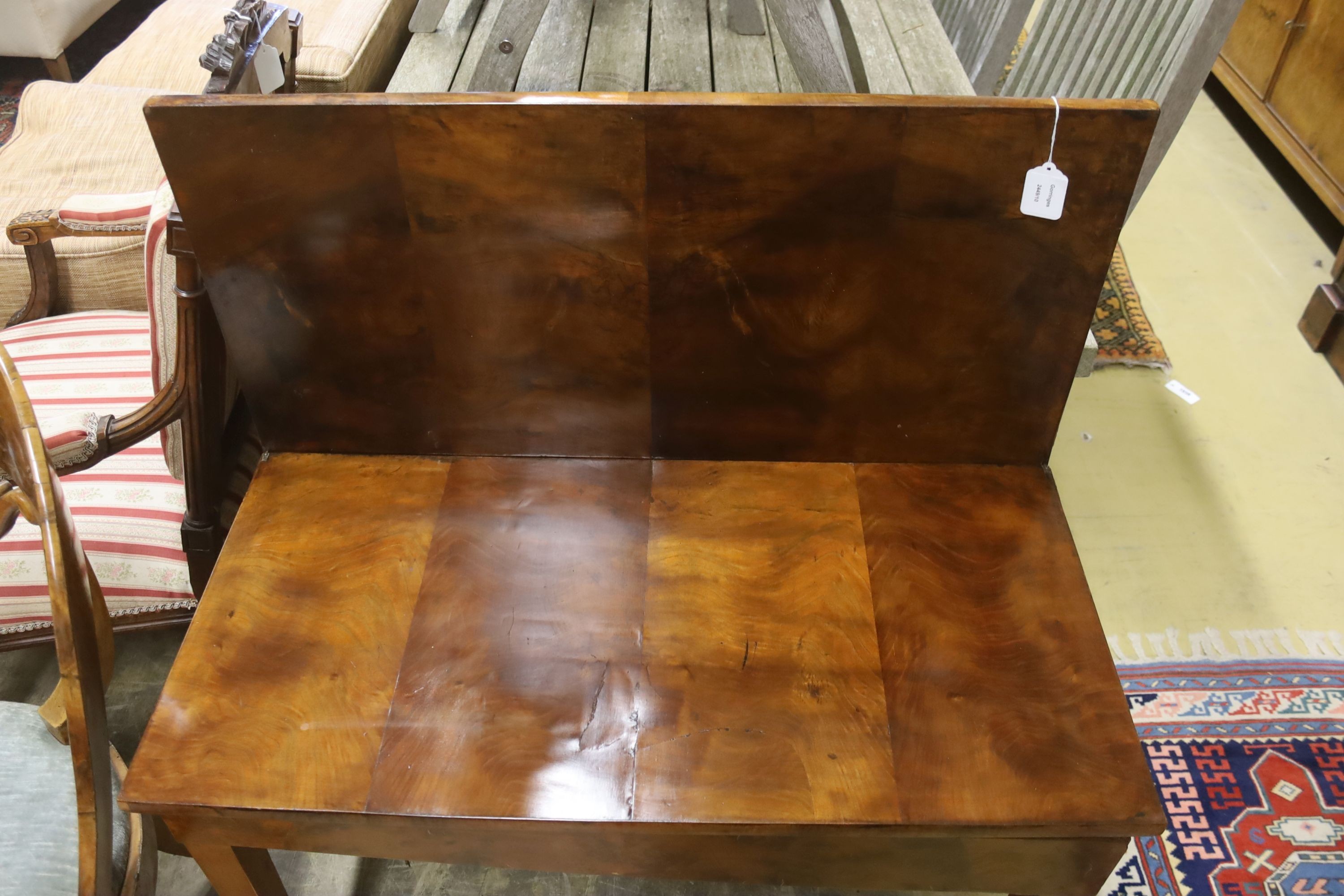 A 19th century Continental walnut rectangular tea table with folding top, (cut down), width 89cm, dpeth 44cm, height 63cm